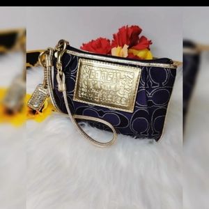 Coach Purple & gold Poppy Wristlet